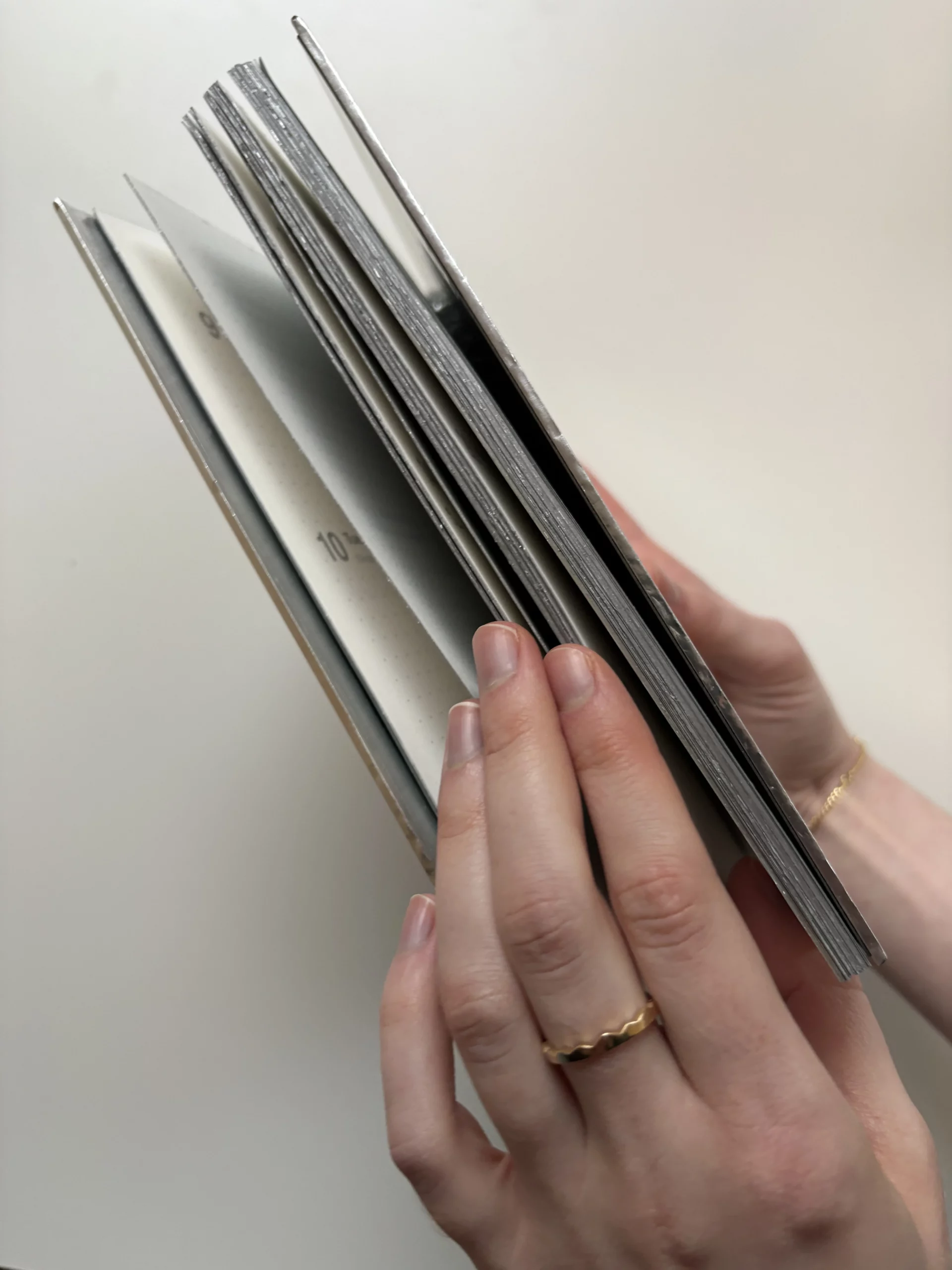 Memo_book with a mirror silver foil hardcover and matching silver-coloured edges.